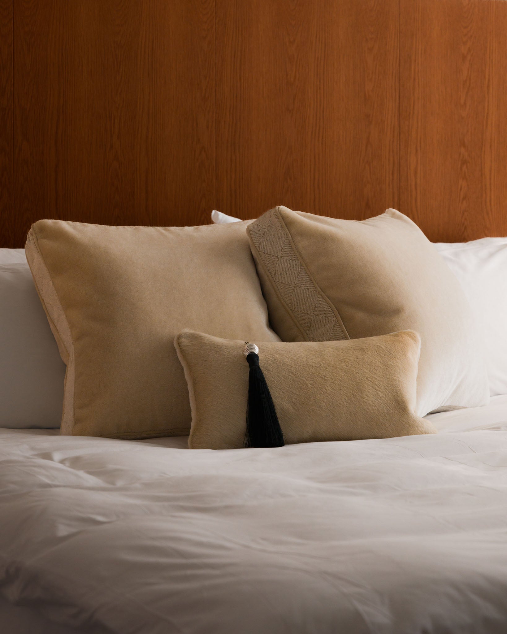 Chime mohair velvet cushion and Lilt hair-on hide cushion, Soft Service by Studio Nicholas, Noosa