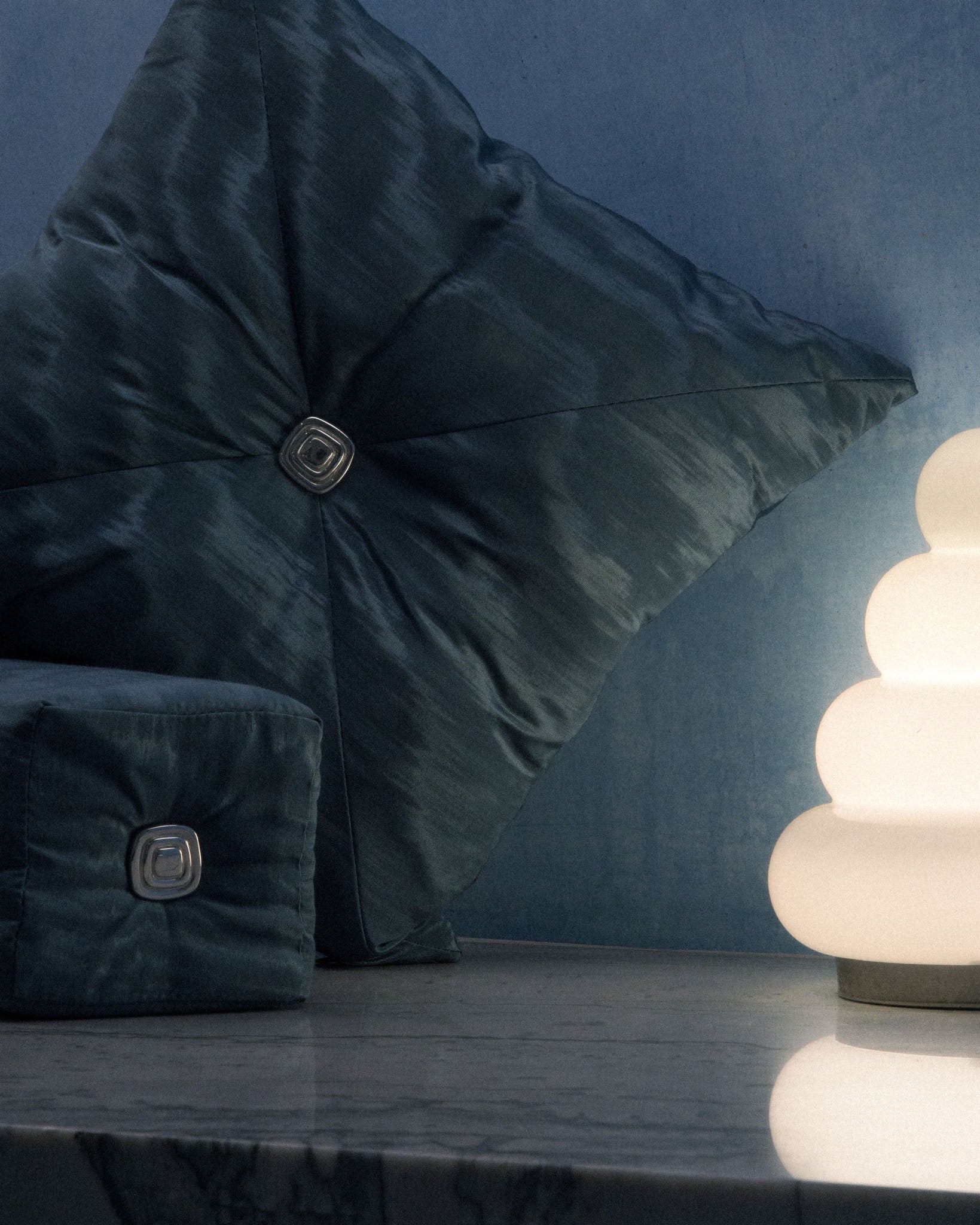 Hush cushion and Lull bolster in Lake blue moiré, styled together, Soft Service by Studio Nicholas, Noosa